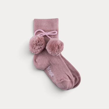 Mid-calf socks with pompoms