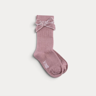 Ribbed knee-high socks with a bow