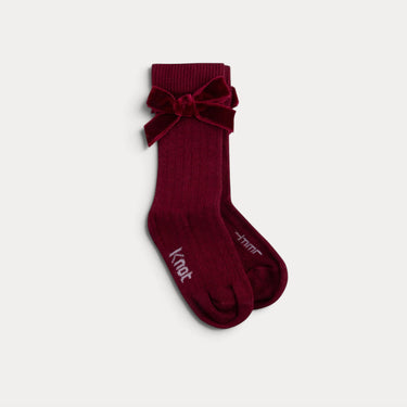 Ribbed knee-high socks with a bow